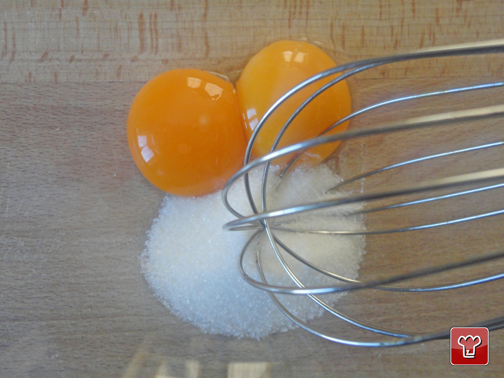 Beat the eggs yolks with the sugar