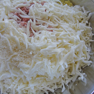 Add the grated provolone