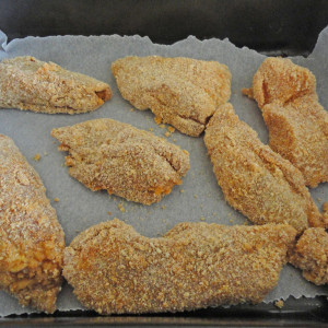 Arrange the chicken on the baking parchment