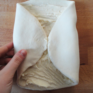 Place the butter on the first dough